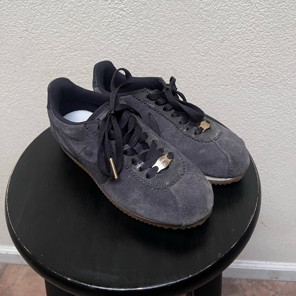 Gray suede Nike Cortez